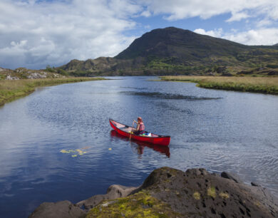 Canoeing on The Long Range, Killarney Lakes, Killarney National Park, County Kerry, Ireland.