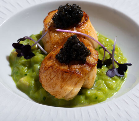 Seared scallops topped with caviar served on a green vegetable purée at Yew Tree Restaurant in Killarney