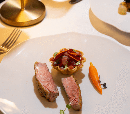 Premium Irish meat course with seasonal vegetables and artisan tartlet at Yew Tree Restaurant in Killarney