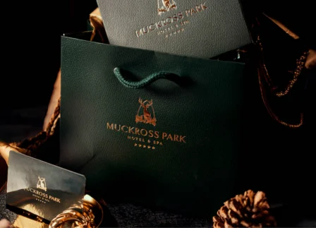 Luxurious Muckross Park Hotel gift bag with elegant gold accents, perfect for a memorable stay or spa experience.