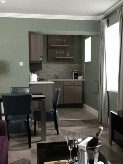 Open-plan living, dining and kitchen area in The Reserve self-catering apartments in Killarney.