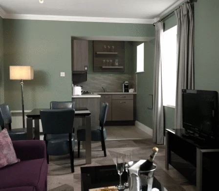 Open-plan living, dining and kitchen area in The Reserve self-catering apartments in Killarney.