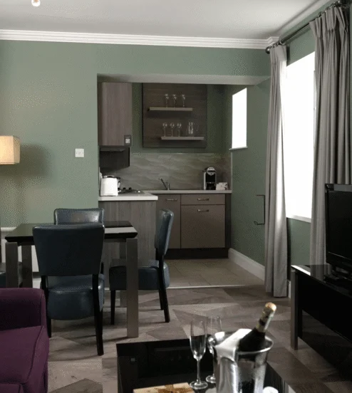 Open-plan living, dining and kitchen area in The Reserve self-catering apartments in Killarney.